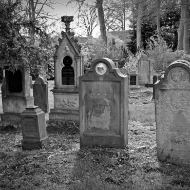 Burial of stillborn baby in mixed graveyard