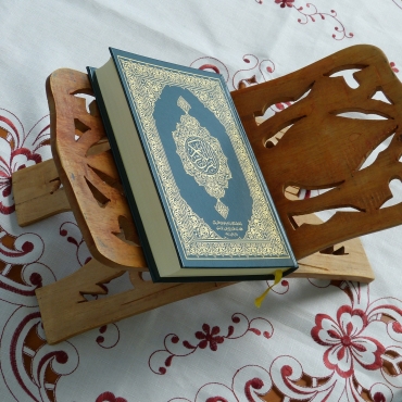 Woman in menses reciting Quran