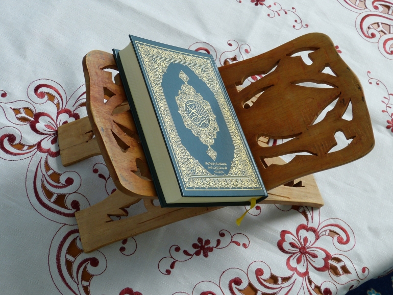 Woman in menses reciting Quran