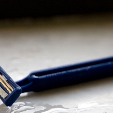 Shaving pubic hair of elderly father