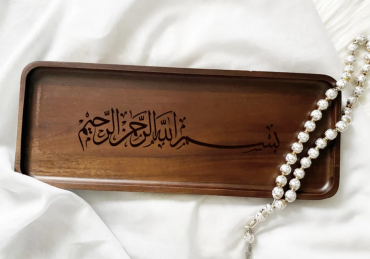 Writing Bismillah on a serving platter